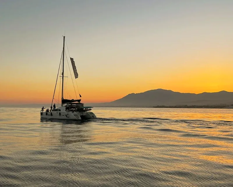 Puerto Banus marina at sunset with superyachts and golden light, Marbella Costa del Sol