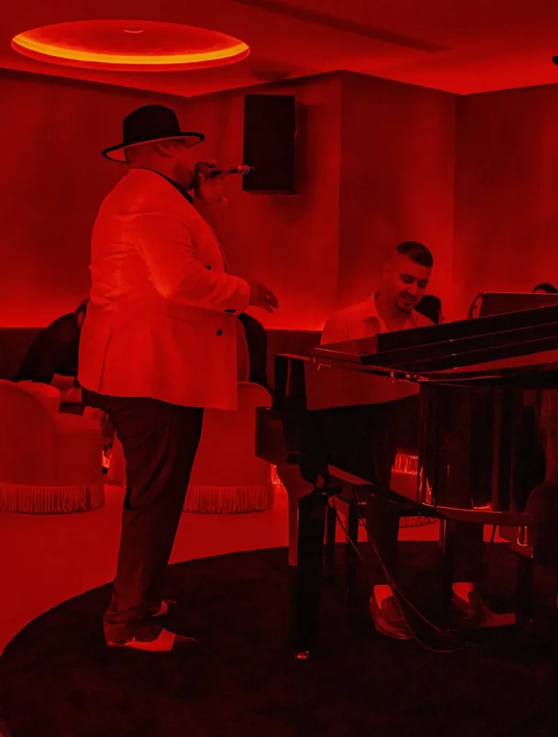 Le Jade piano bar Marbella intimate interior with pianist and low lighting
